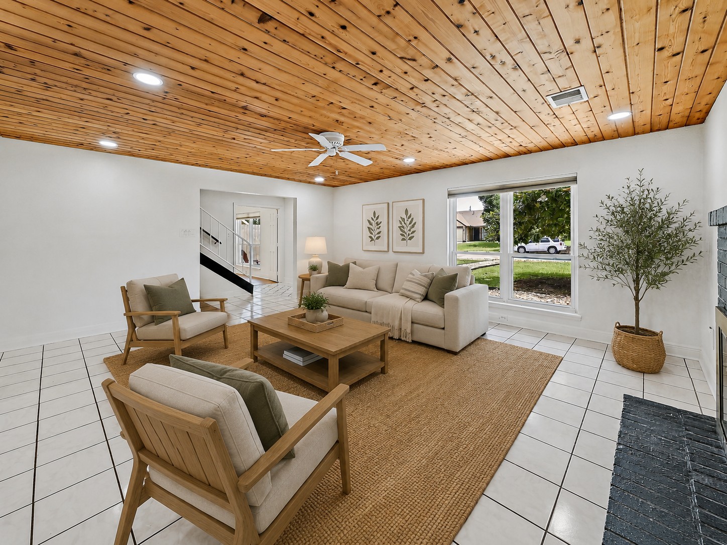 Living room with wood ceiling and natural light
