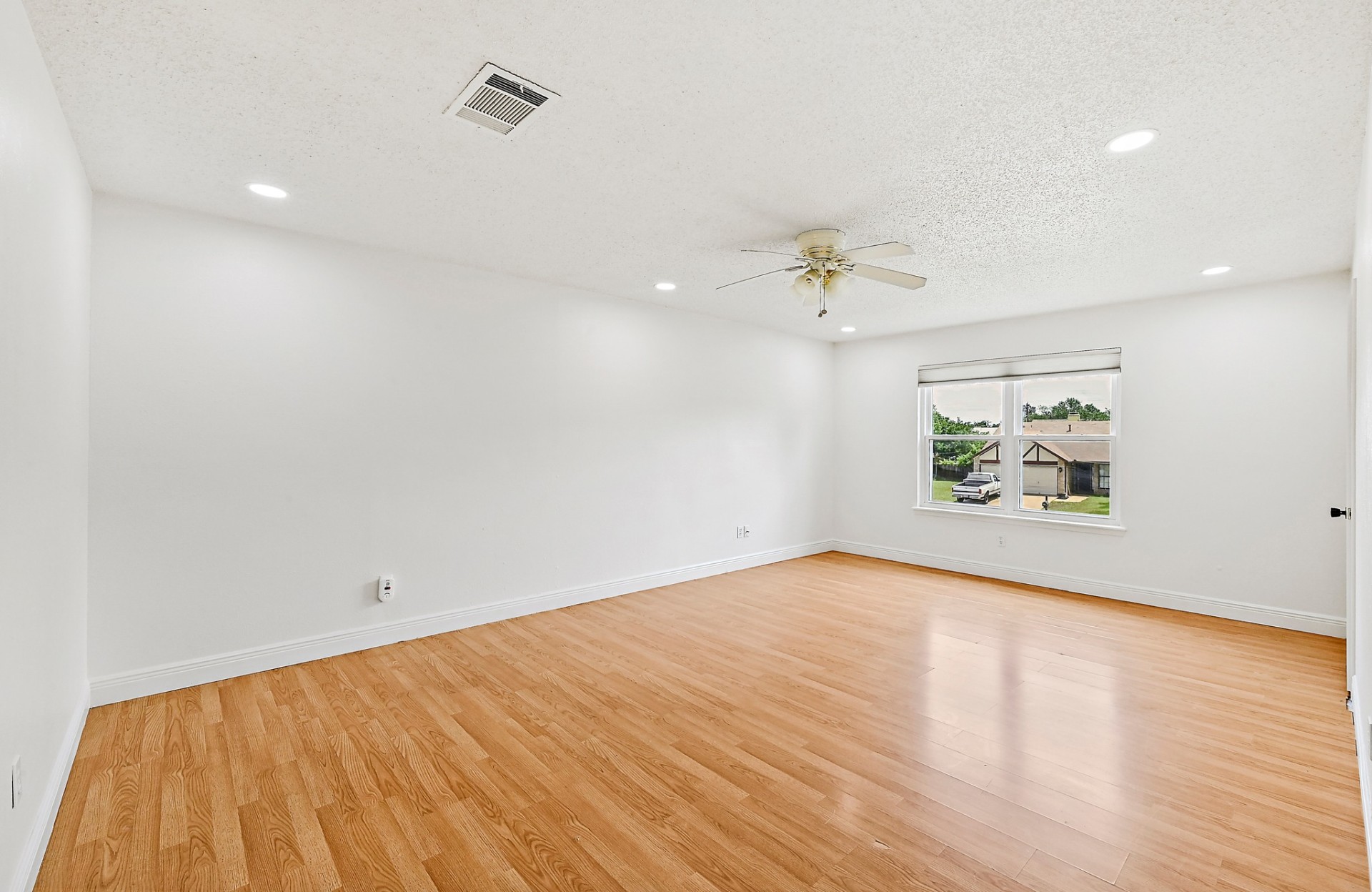 Primary Bedroom — Bed Wall — current, vacant